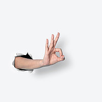 Hand makes okay sign.