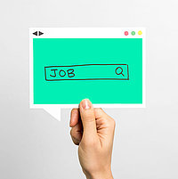 Hand holds green slip for speculative application and job configurator