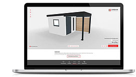 Laptop with a screenshot of a shed configurator.